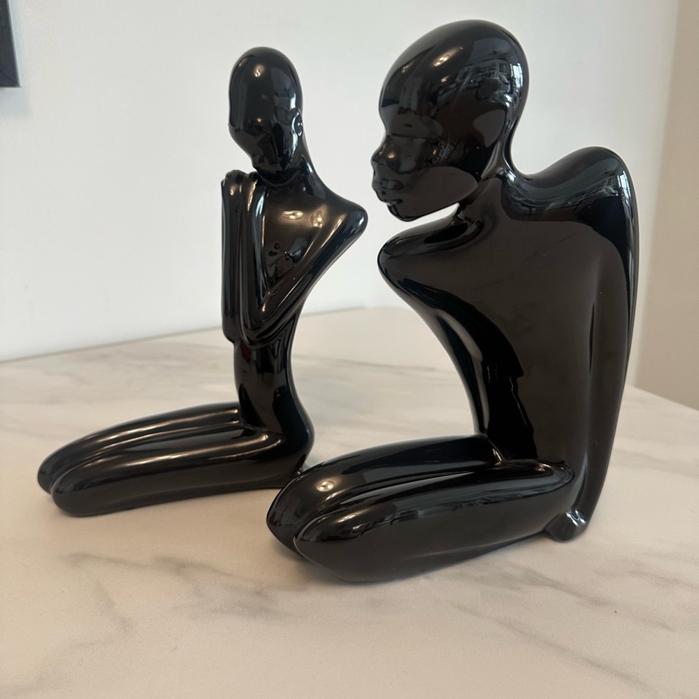 Pair Vintage MCM African Man & Woman Black Ceramic Sculptures